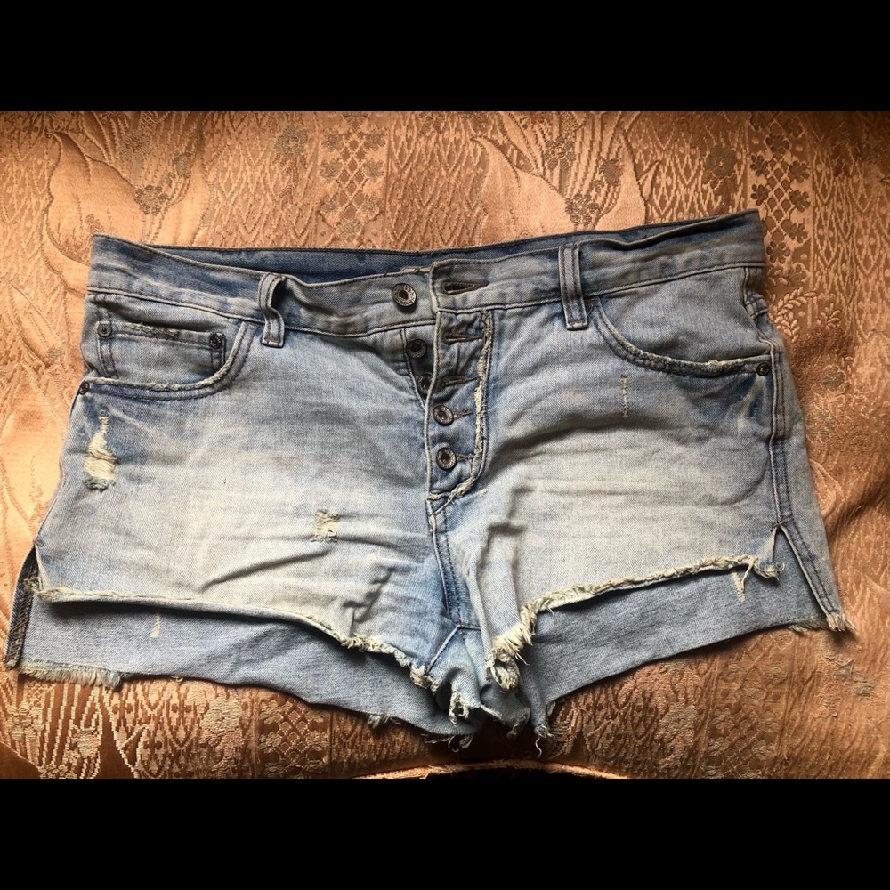 Free People denim distressed button fly shorts
